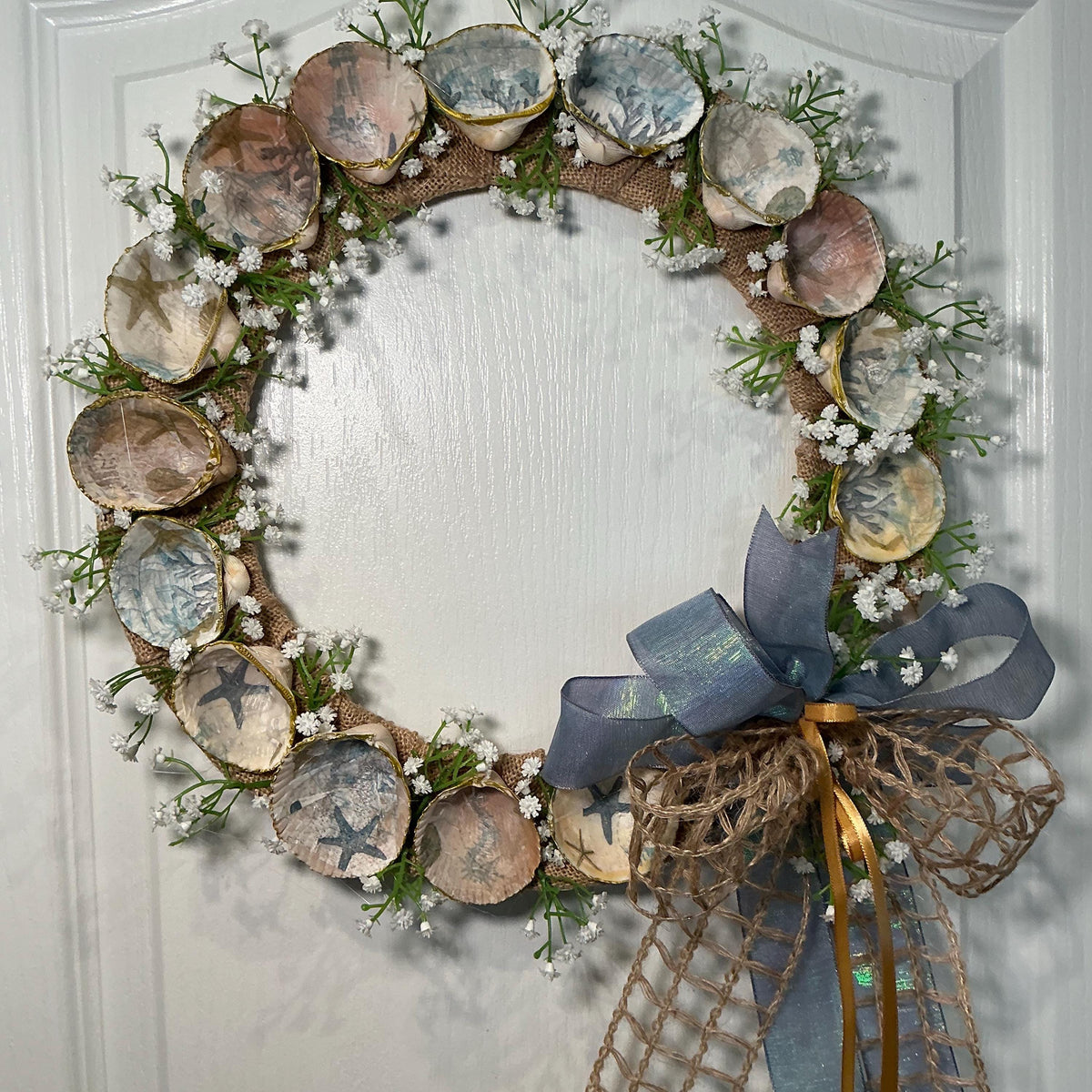 14 Inch Coastal Seashell Wreath with Starfish and Burlap on Metal Frame
