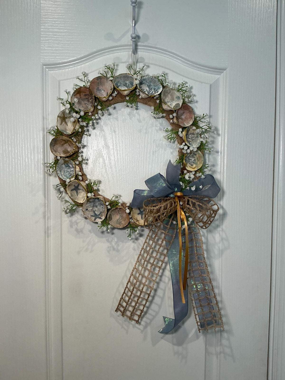 14 Inch Coastal Seashell Wreath with Starfish and Burlap on Metal Frame