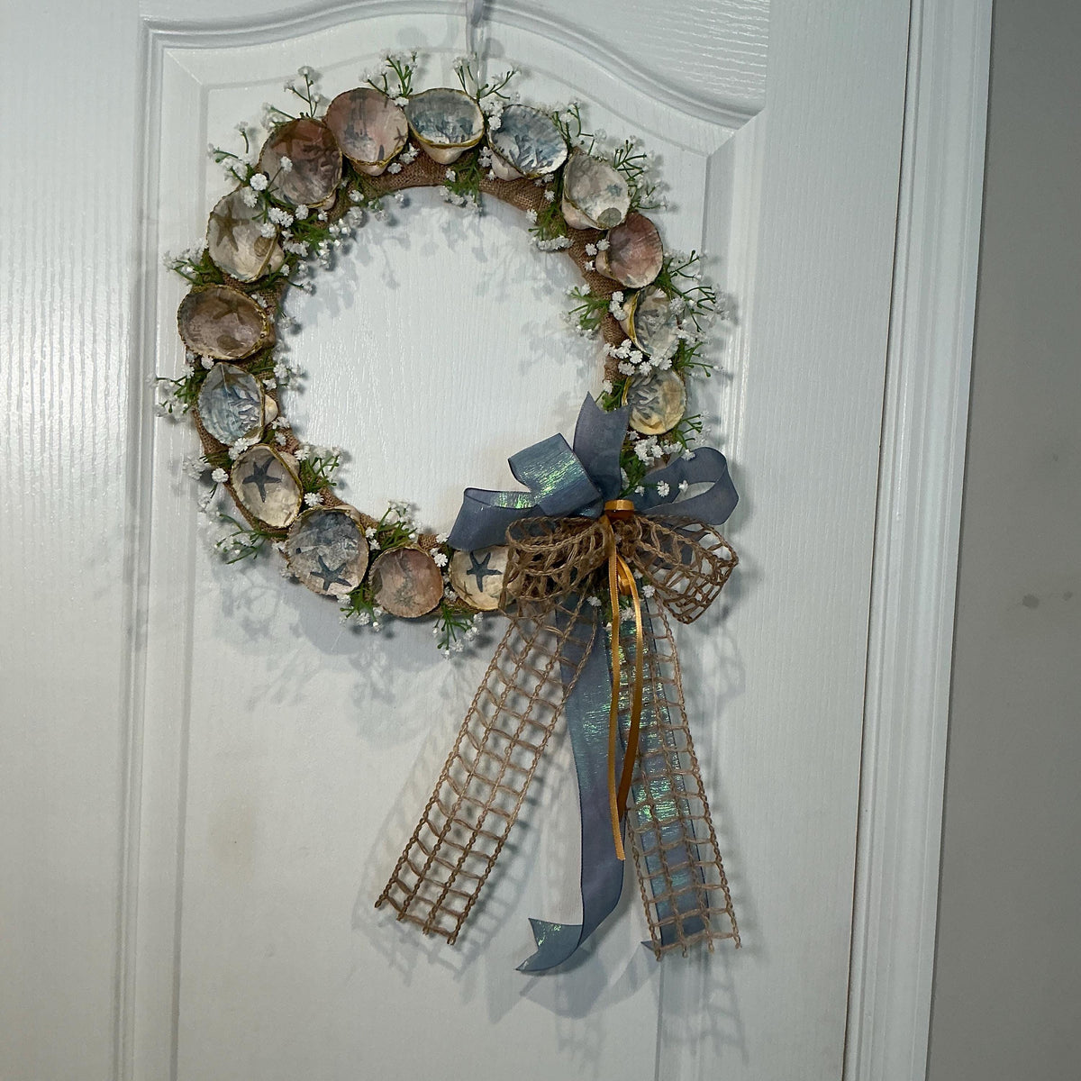 14 Inch Coastal Seashell Wreath with Starfish and Burlap on Metal Frame