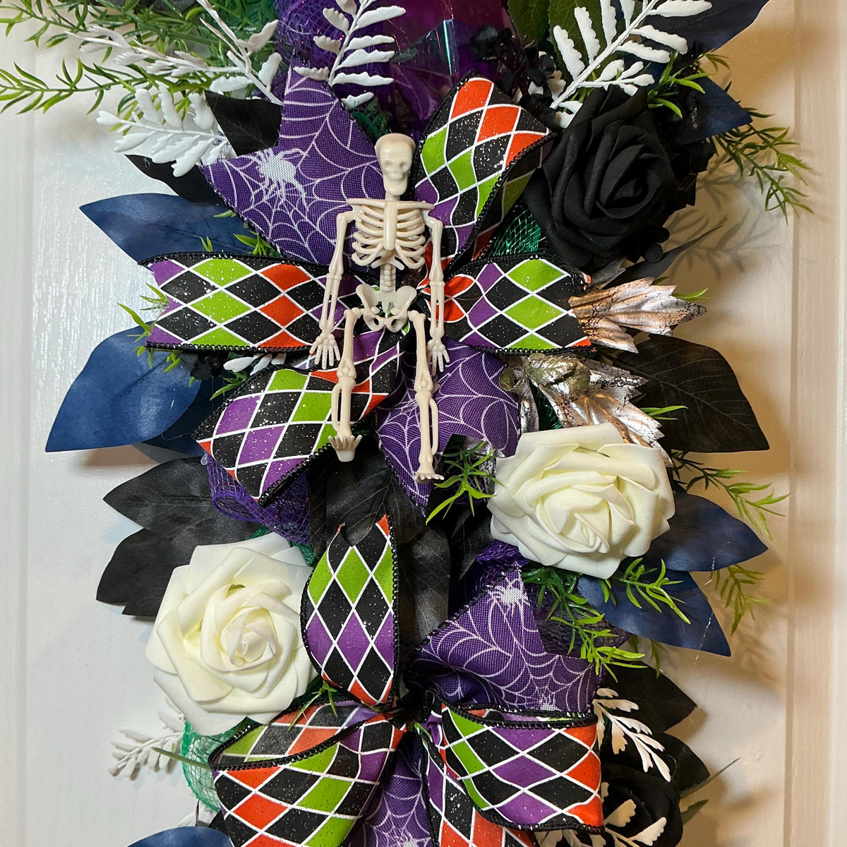 Gothic Halloween Floral Swag, Black Ivory Roses with Skeleton Spiderweb Bow