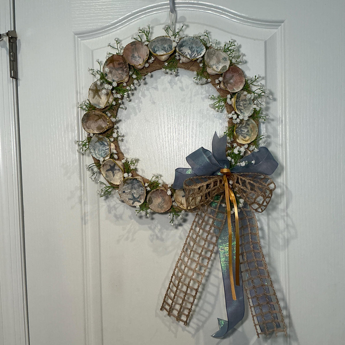 14 Inch Coastal Seashell Wreath with Starfish and Burlap on Metal Frame
