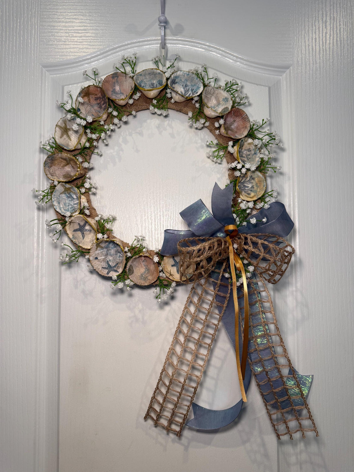 14 Inch Coastal Seashell Wreath with Starfish and Burlap on Metal Frame