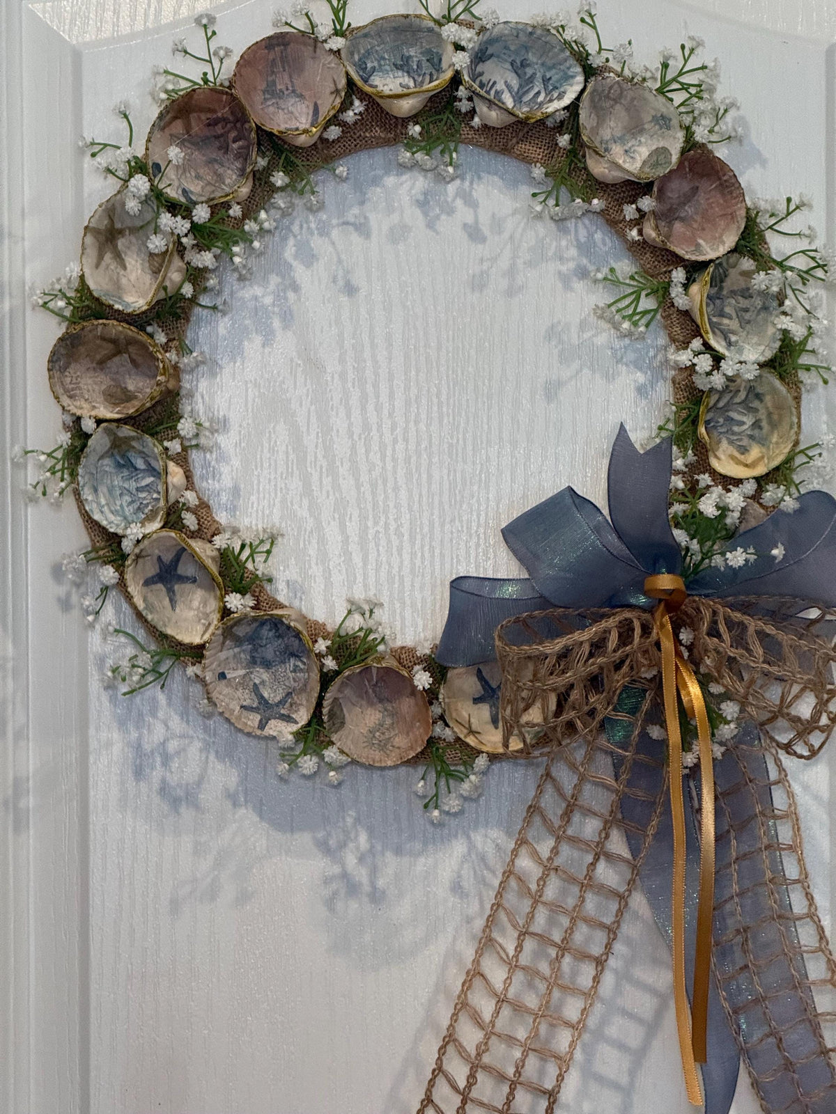 14 Inch Coastal Seashell Wreath with Starfish and Burlap on Metal Frame