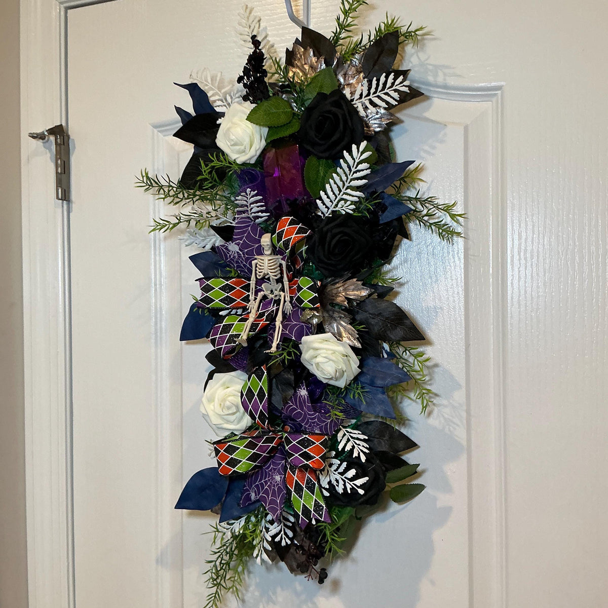 Gothic Halloween Floral Swag, Black Ivory Roses with Skeleton Spiderweb Bow