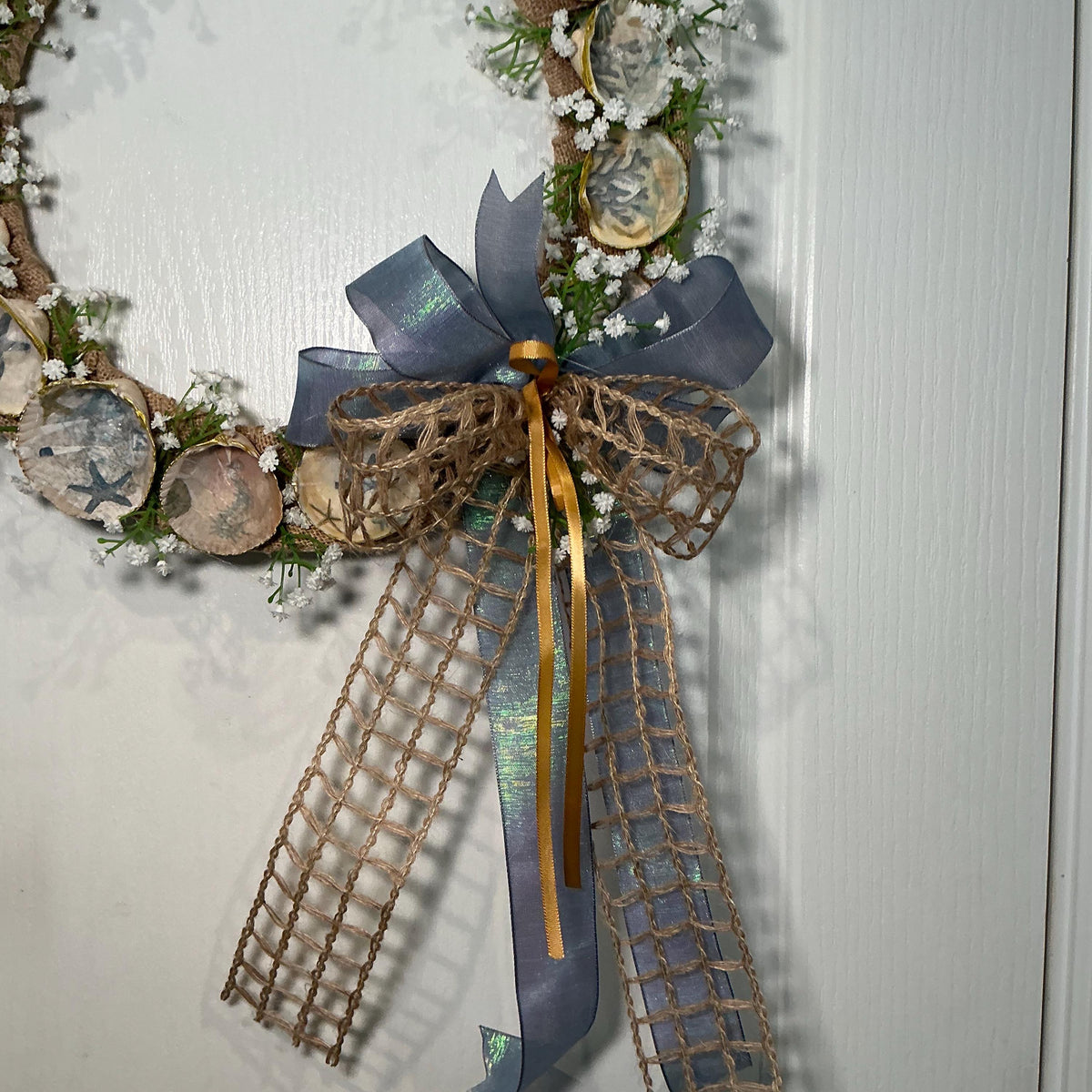 14 Inch Coastal Seashell Wreath with Starfish and Burlap on Metal Frame