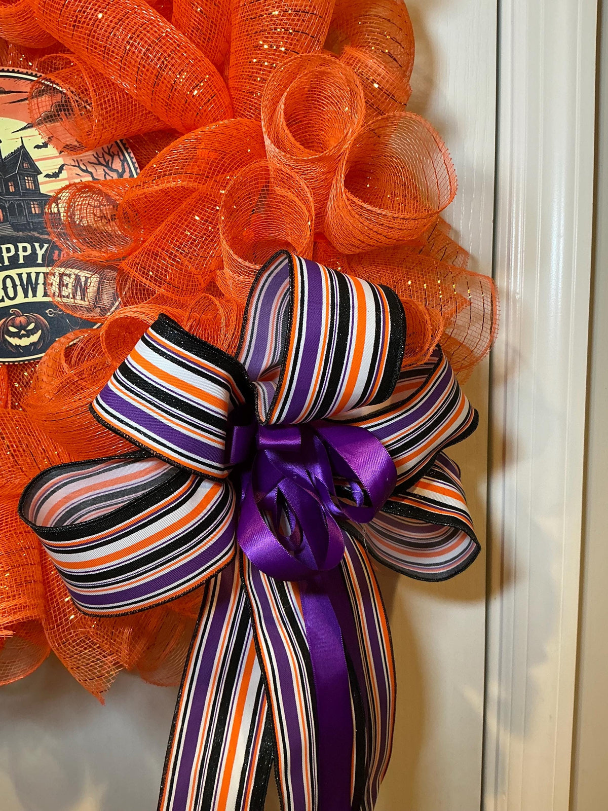 Haunted House Halloween Wreath, 18 Inch Orange Mesh with Black White Pumpkins and Purple Bow — photo 3