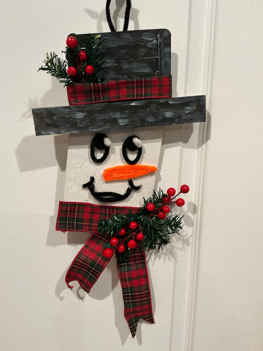 Wood Snowman Door Hanger, Farmhouse Christmas Decor, Plaid Scarf Accent — actual product photo