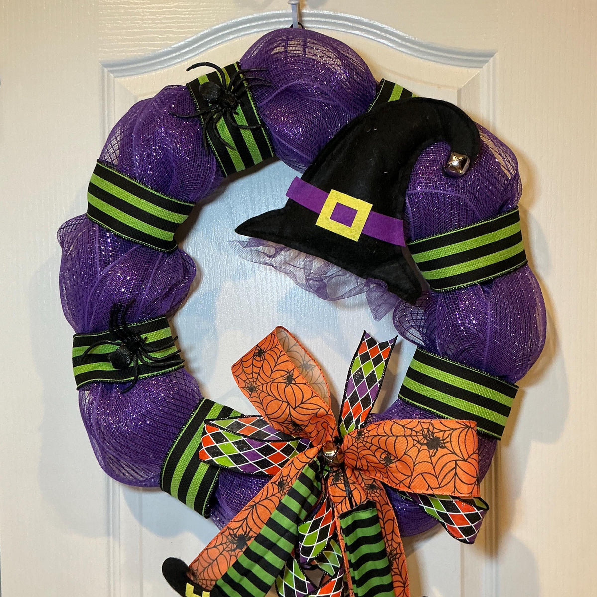 Witch Hat and Boots Halloween Wreath, 18 Inch Purple Glitter Mesh with Spiderweb Bow — actual product photo