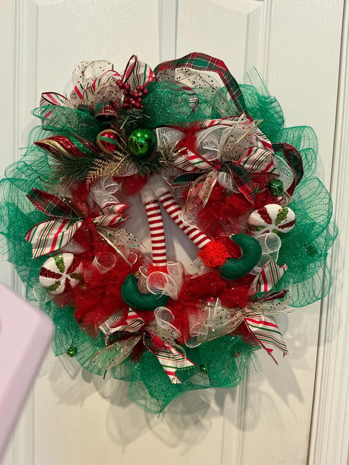 Elf legs Christmas 14 inch wreath, deco, mesh, Holiday door decor, funny elf wreath, red green Xmas front door, wreath whimsical Christmas — actual product photo
