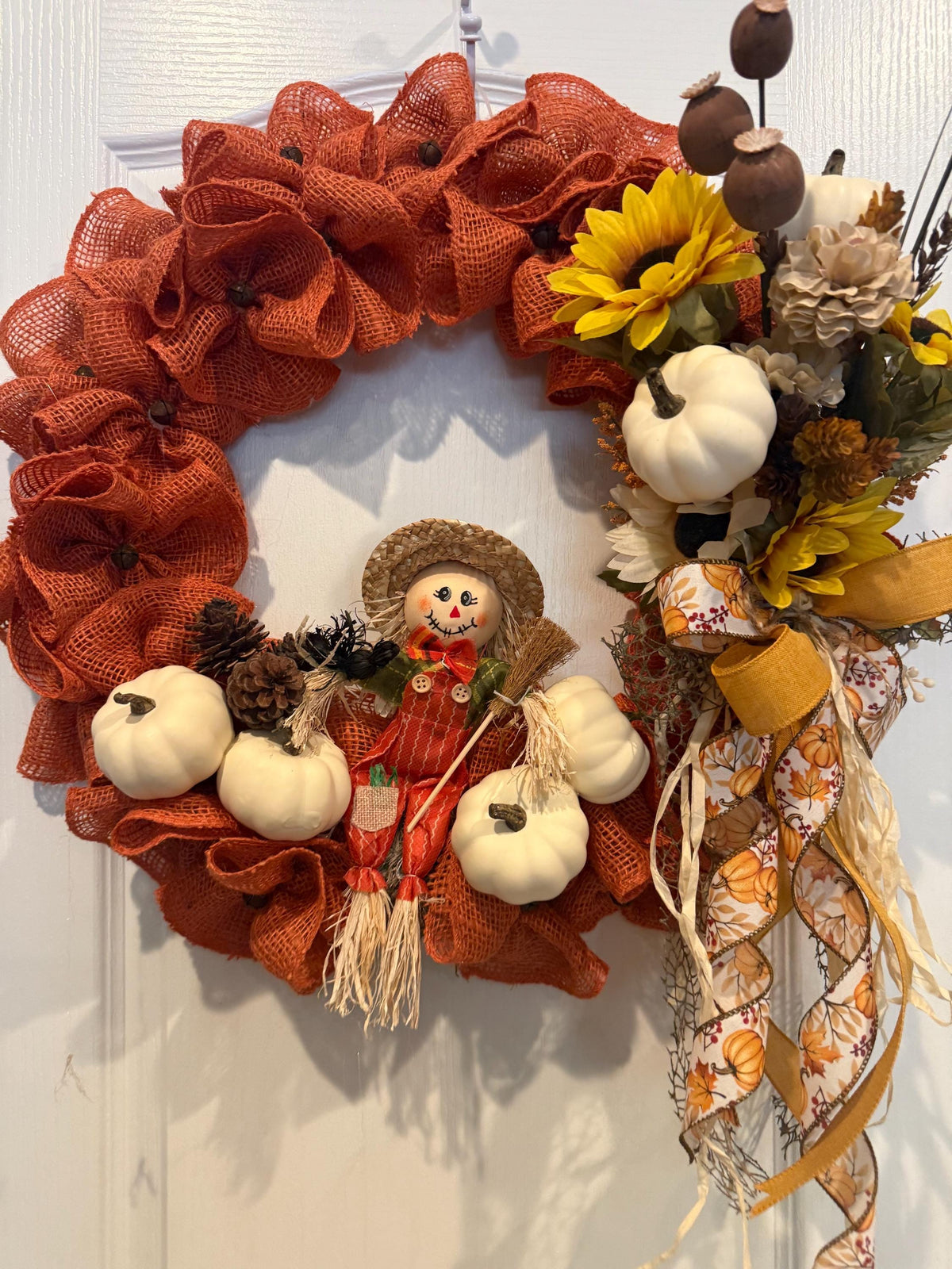 Scarecrow Fall Wreath, 18 Inch Burnt Orange Burlap with Sunflowers and White Pumpkins — actual product photo