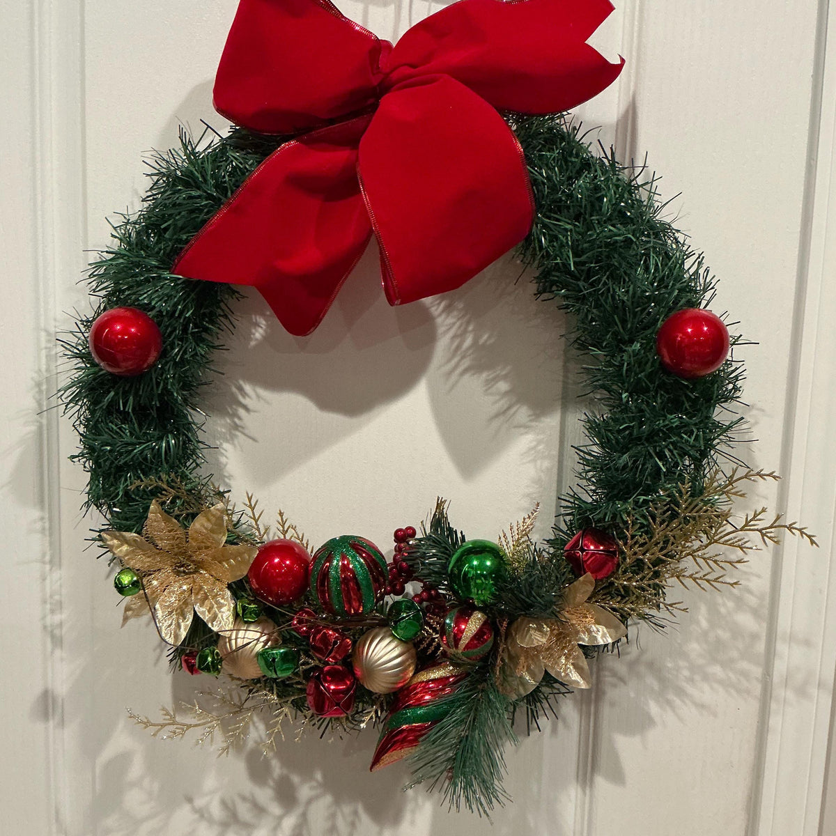 Traditional Christmas Wreath, Red Green Gold Poinsettias, Velvet Bow Front Door Decor — actual product photo