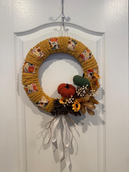 Crochet Pumpkin Fall Wreath with Mustard Yarn, Sunflowers and Pinecones, 15 Inch — actual product photo
