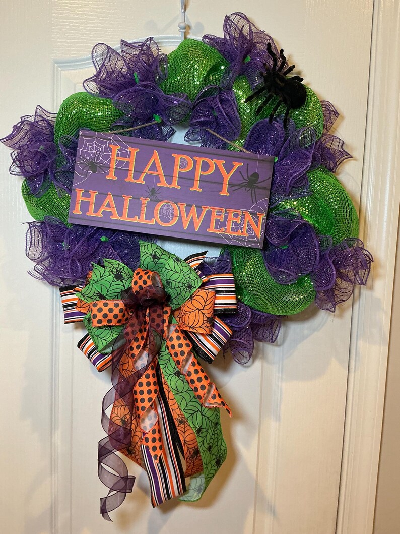 Actual front photograph of Happy Halloween purple and green handmade wreath