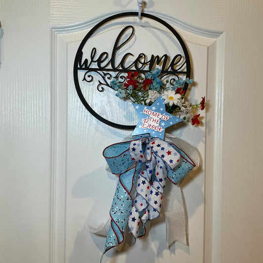 metal black welcome sign for front porch Americana flowers and ribbon