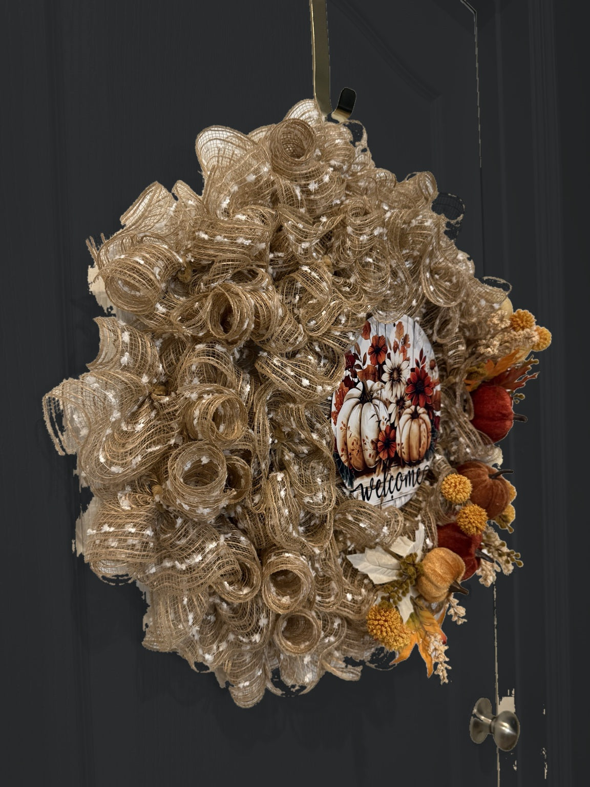Welcome to Fall wreath on black door, side view