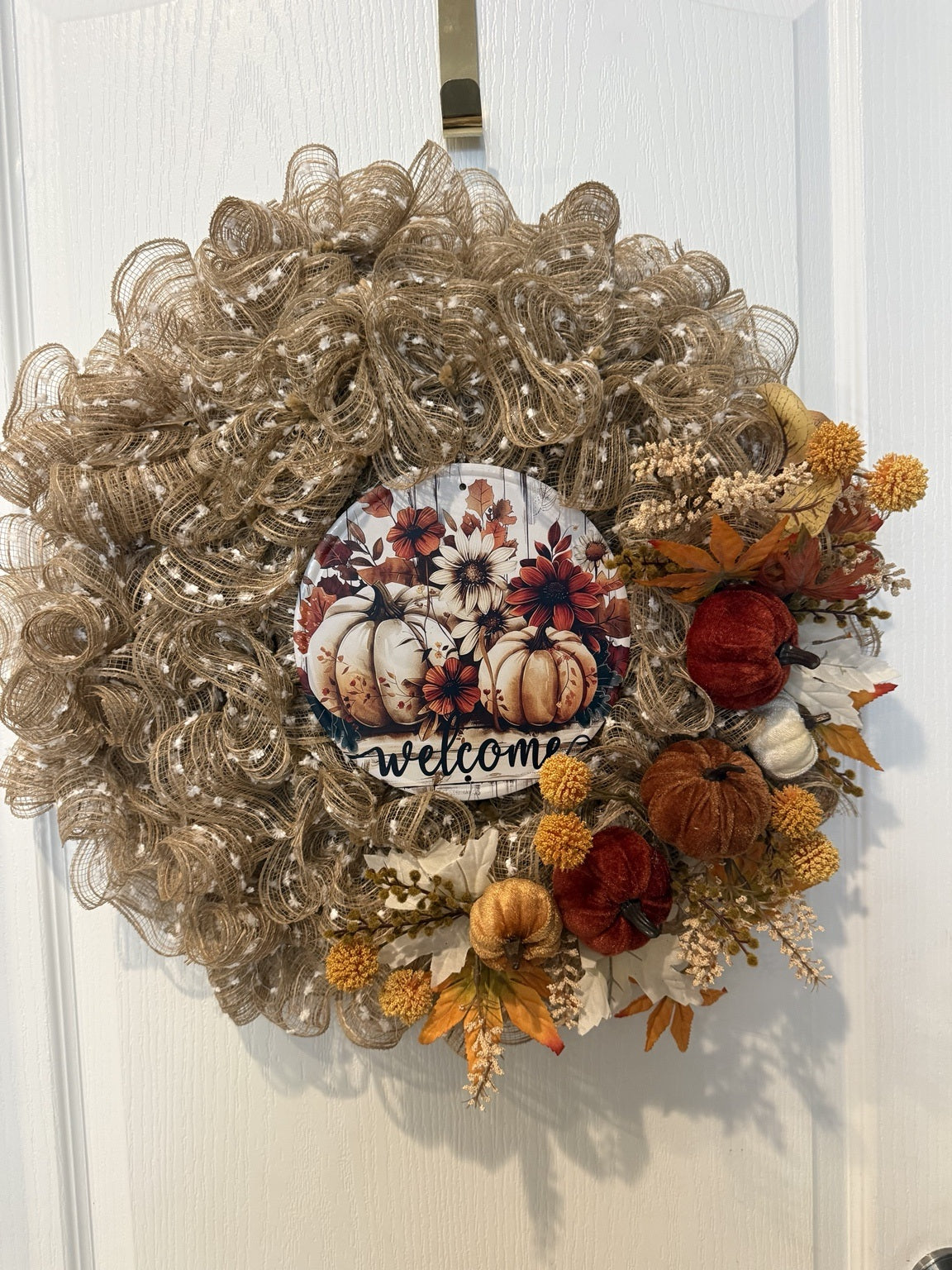 Welcome to Fall wreath on white door, front view