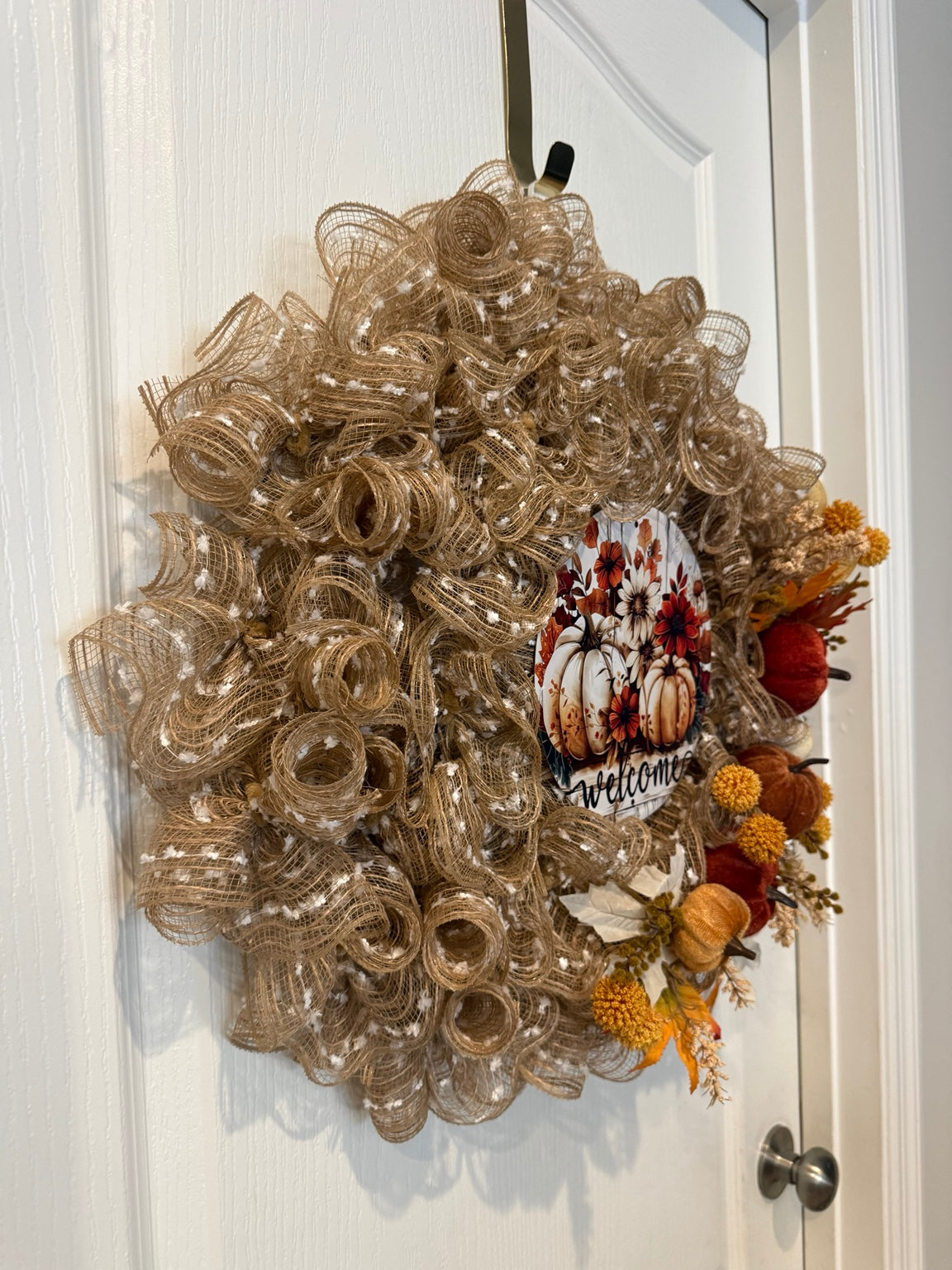 Side view of Welcome to Fall handmade autumn wreath showing layered deco mesh and fall decorations